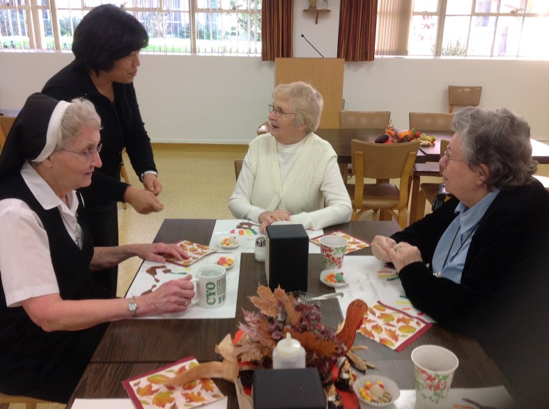 Sisters preparing for Thanksgiving Feast