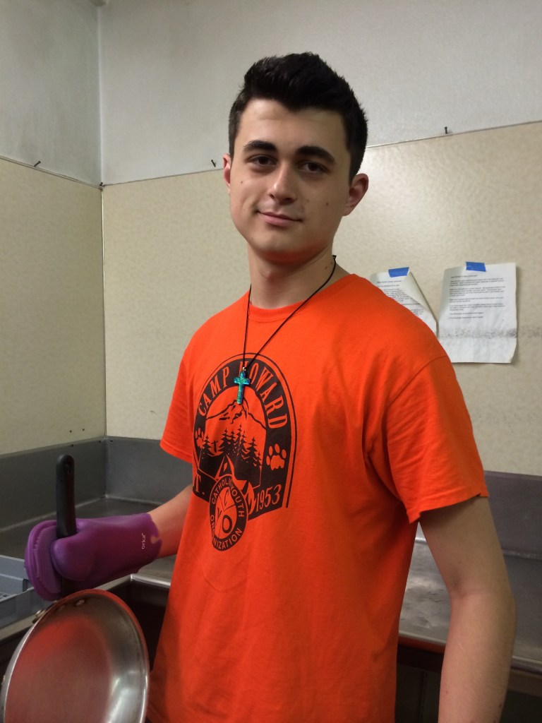 Drew works hard in the camp kitchen, one of the most important functions of the camp.