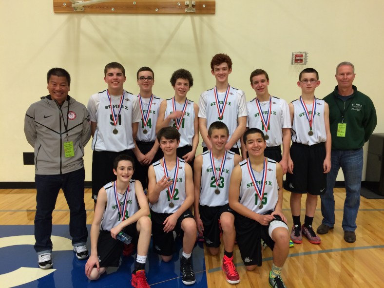 St. PIus X takes third place in the 2015 CYO City Basketball Tournament.