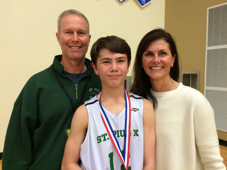 Michael and Joan O'Reilly with their son after the City Championship Game.