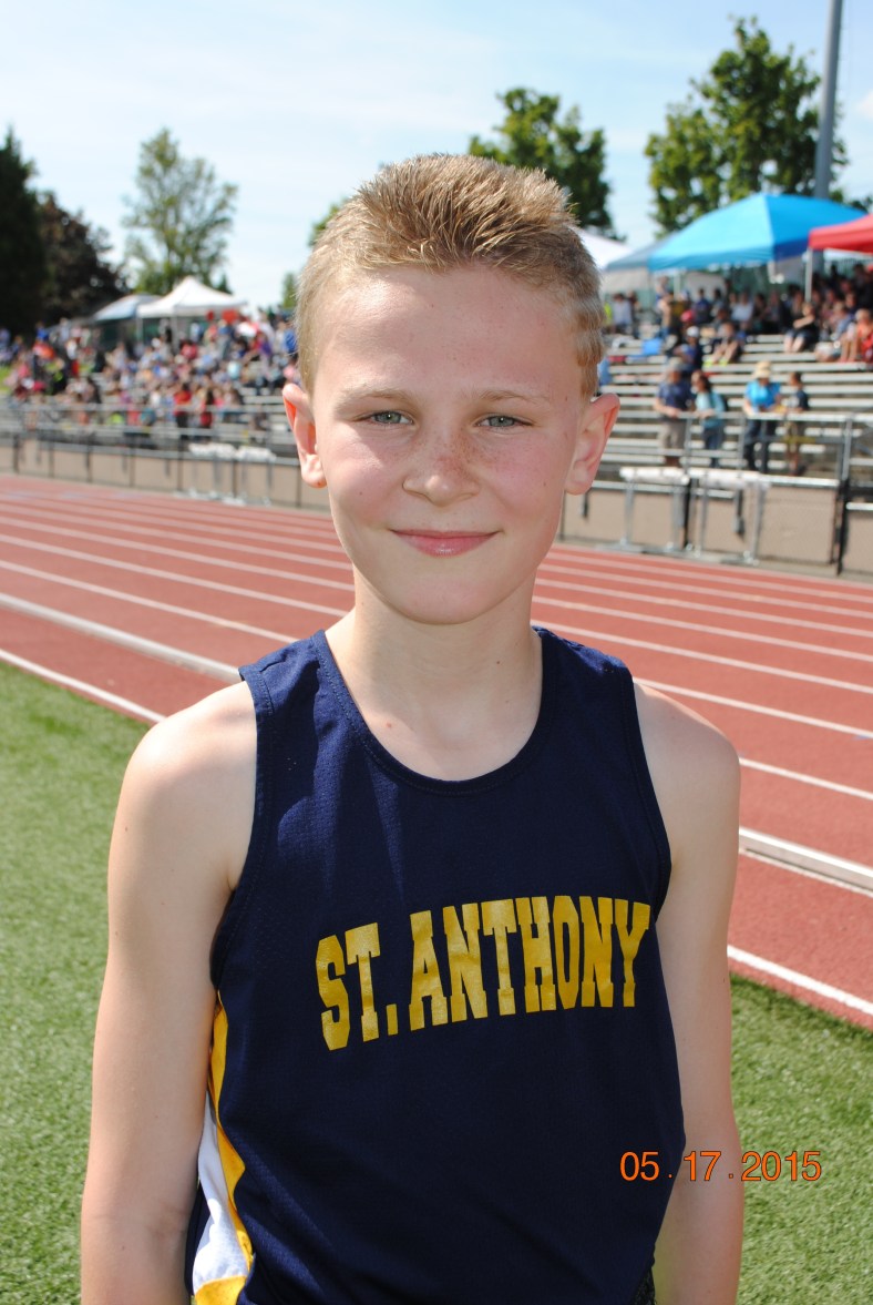 Jeffery Rogers (St. Anthony) wins the Cub Boys division of the 1500 Meter run at the CYO Meet of Champions 2015
