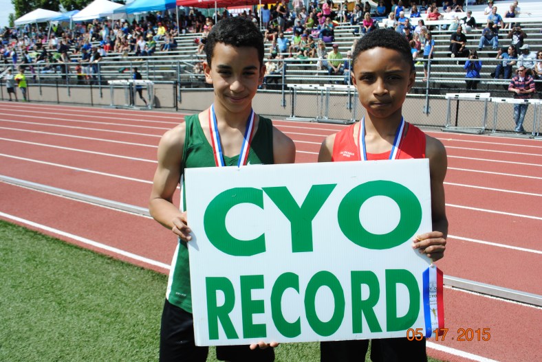 Denzel Pinto and Nathan Mouzong break the CYO Cub Boys Record for the 400 Meter Dash.