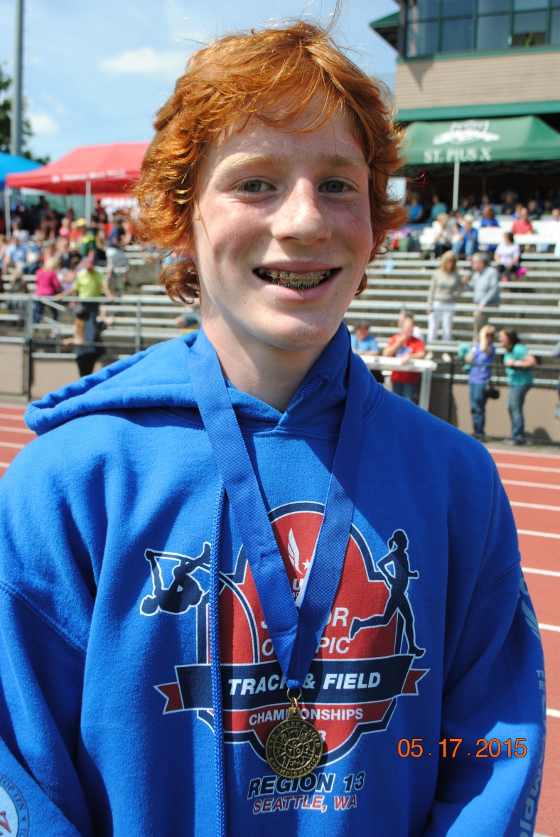 Blake Deringer wins the Cadet Boys 400 Meter Dash at the 2015 CYO Meet of Champions