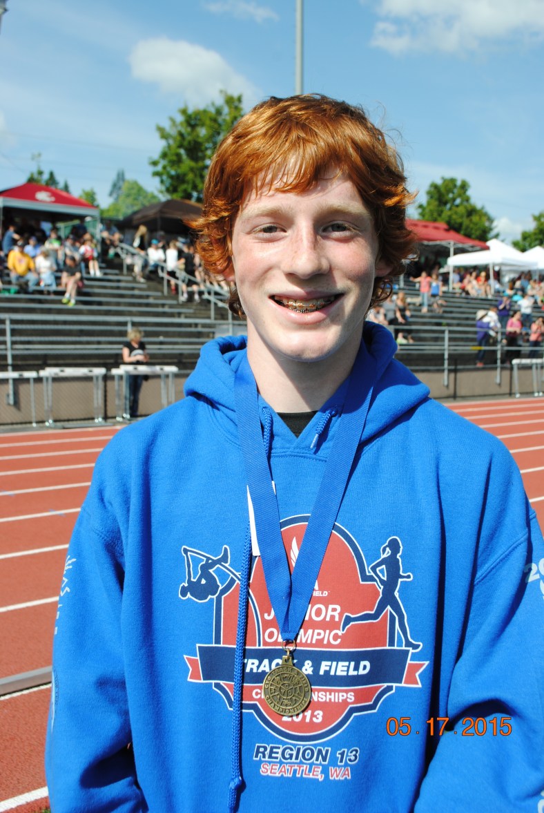 Blake Deringer wins the Cadet Boys 200 Meter Dash at the 2015 CYO Meet of Champions