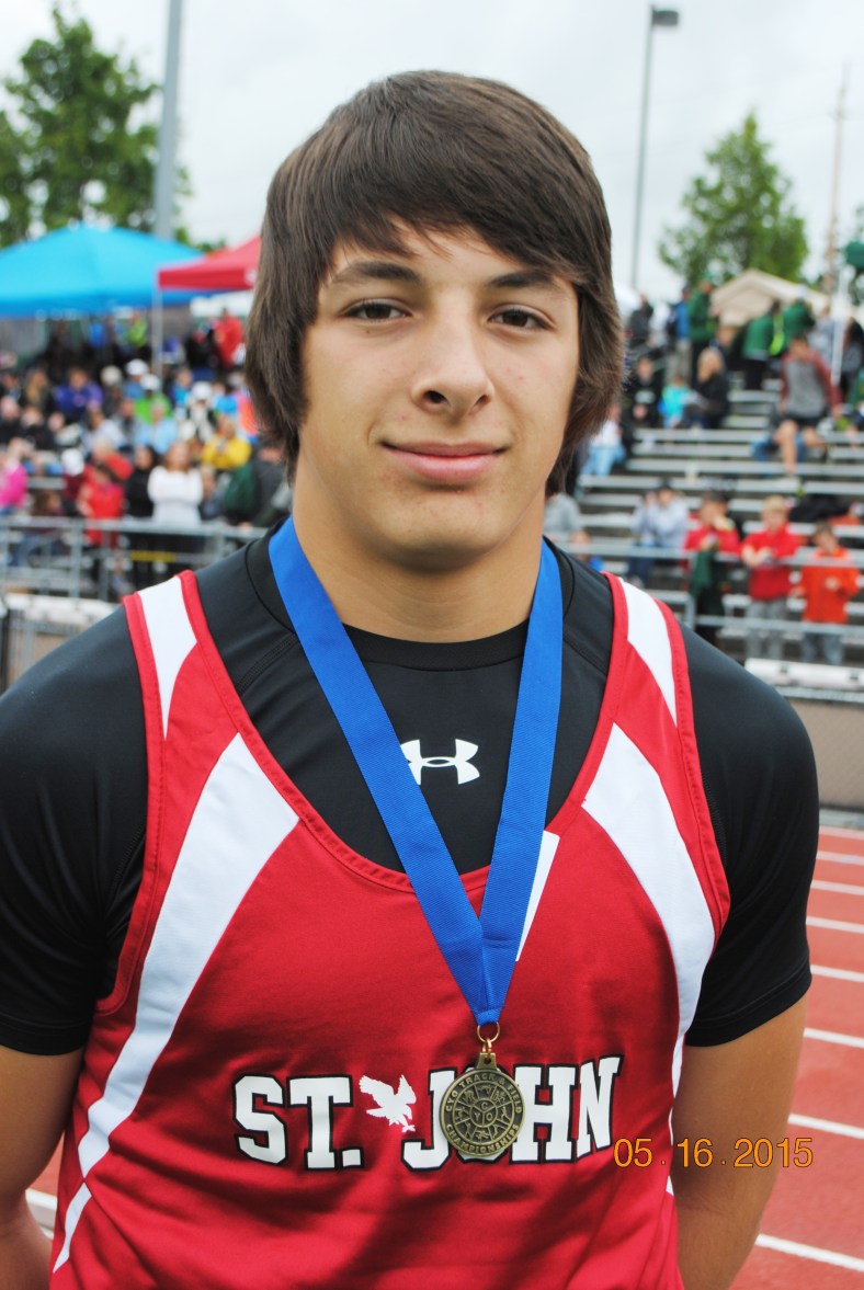Lane Marshall from St. John the Baptist wins the CYO Shot Put Championship 2015