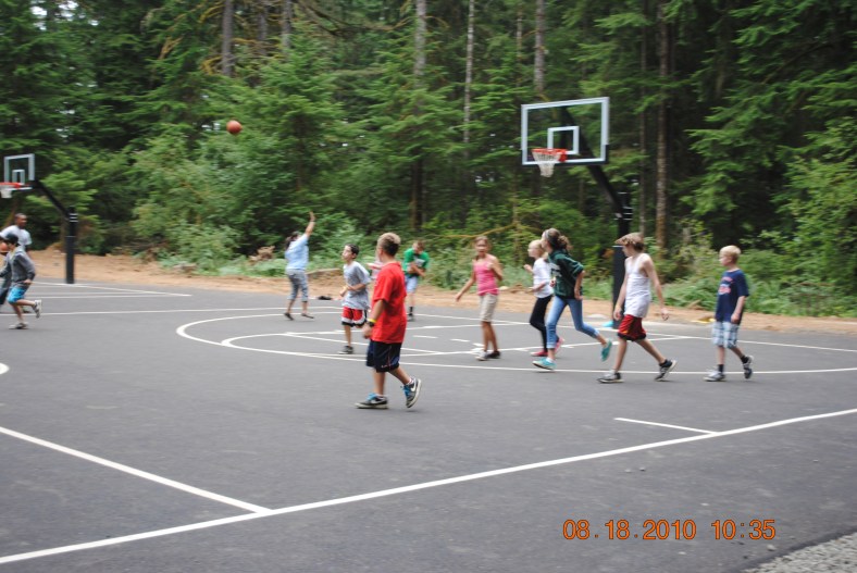 Camp Howard campers enjoying the basketball courts.