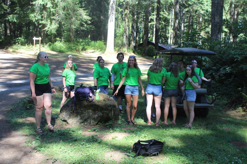 Counselors wait for the busses to arrive