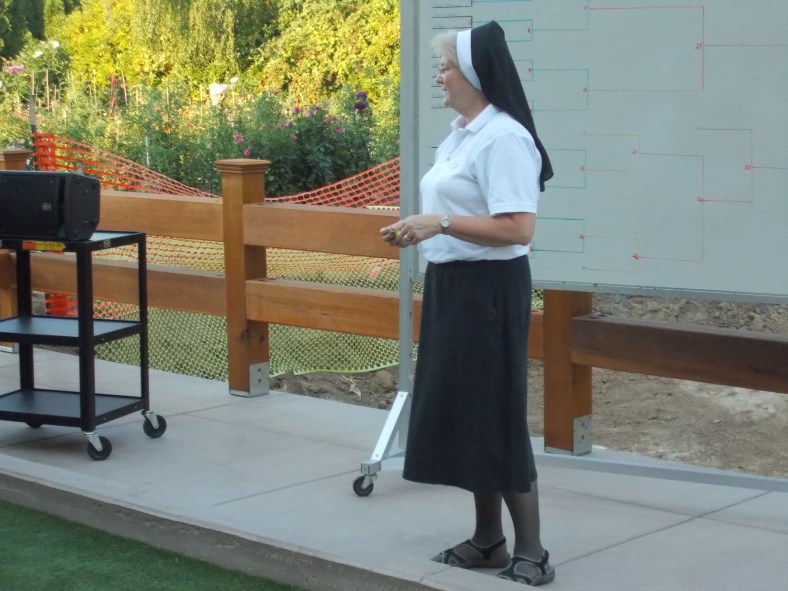 Sr. Michael Francine is often called upon to "measure" and determine who is closest to the "jack"