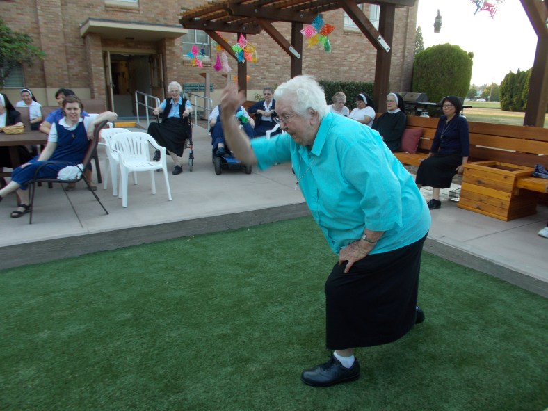 Sister Ina Marie takes her turn at trying to get her bocce ball closest to the "Jack"